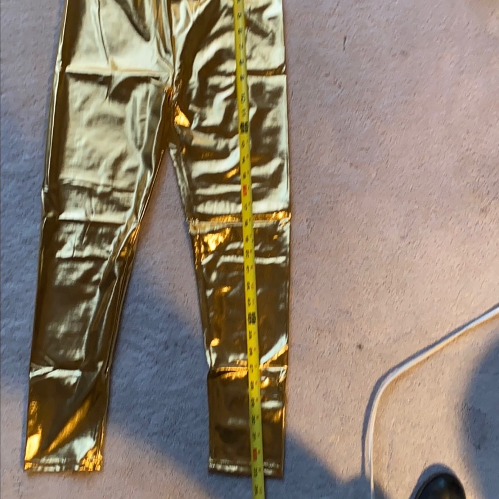 Halloween/Burning Man costume shiny  gold leggings.